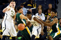 Ricky Doyle (32) and Caris LeVert (23)