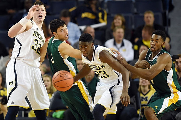 Ricky Doyle (32) and Caris LeVert (23)