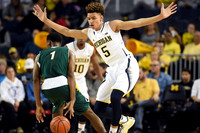 Derrick Walton Jr. (10) and D.J. Wilson (5)