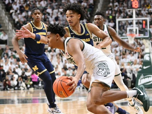 Tarris Reed Jr. (32) and Kobe Bufkin (2)