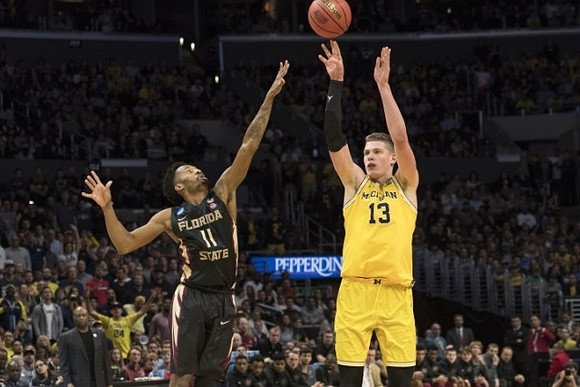 Moritz Wagner (13) and Florida State Head Coach Leonard Hamilton