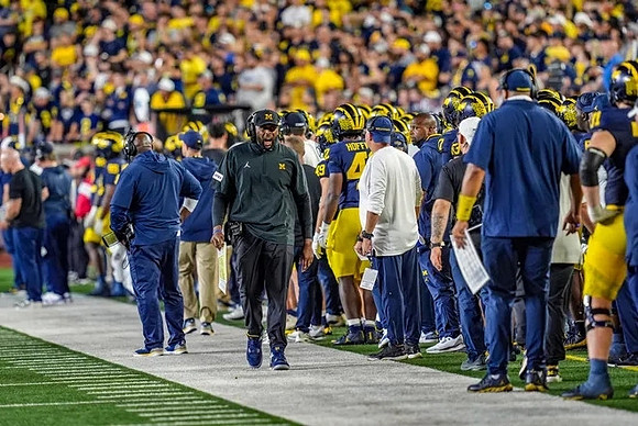 Sherrone Moore and Michigan Team