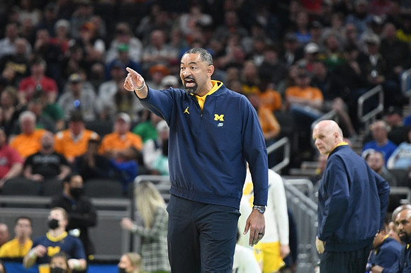 Juwan Howard and Phil Martelli