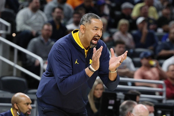 Juwan Howard and Saddi Washington