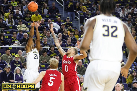Jace Howard (25) and Tarris Reed Jr. (32)