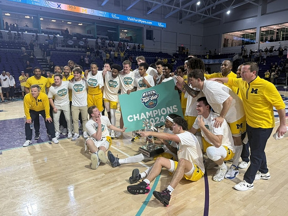 Dusty May and Michigan Team