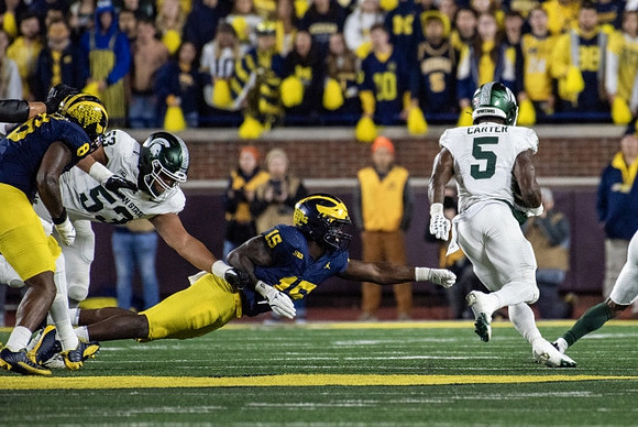 Derrick Moore (8) and Ernest Hausmann (15)