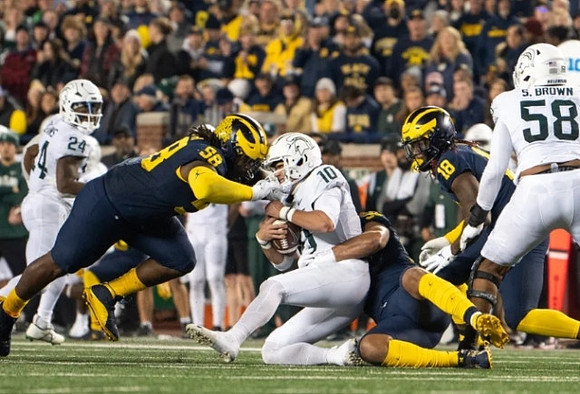 Mazi Smith (58), Jaylen Harrell (32), and Eyabi Anoma Okie (18)