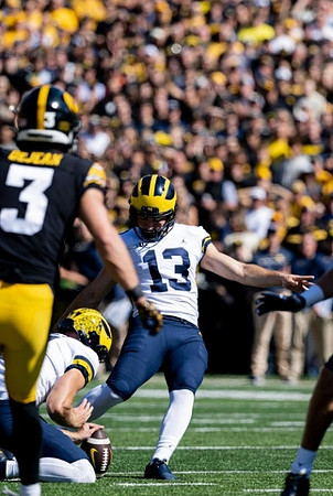 Brad Robbins (91) and Jake Moody (13)