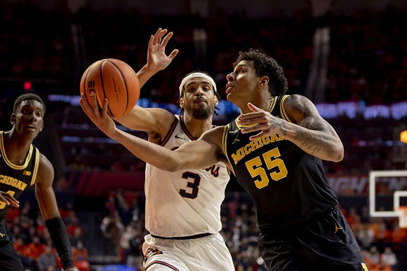 Moussa Diabate (14) and Eli Brooks (55)