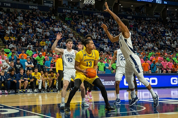 Jett Howard (13) and Tarris Reed Jr. (32)