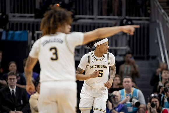Tre Donaldson (3) and Rubin Jones (15)