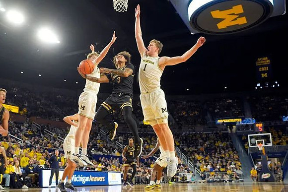 Sam Walters (24) and Danny Wolf (1)