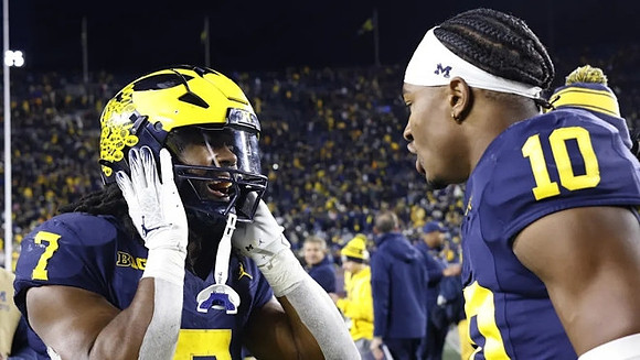 Donovan Edwards (7) and Alex Orji (10)