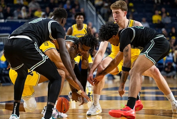Nimari Burnett (4), Danny Wolf (1), and L.J. Cason (2)