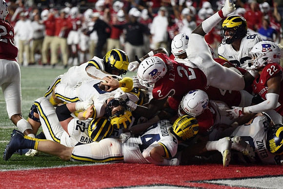 J.J. McCarthy (9), Karsen Barnhart (52), Joel Honigford (84), Max Bredeson (82), and Zak Zinter (65)