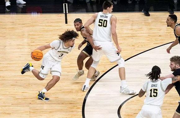 Tre Donaldson (3), Vladislav Goldin (50), and Rubin Jones (15)