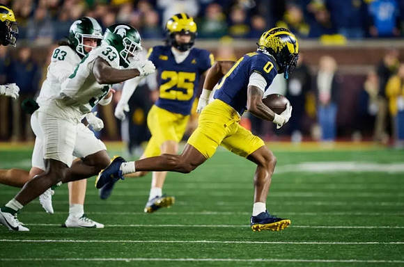 Mason Curtis (25) and Semaj Morgan (0)