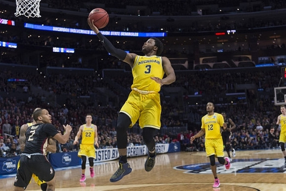 Duncan Robinson (22), Zavier Simpson (3), Muhammad-Ali Abdur-Rahkman (12), and Moritz Wagner (13)