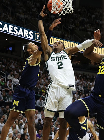 Isaiah Barnes (11) and Tarris Reed Jr. (32)