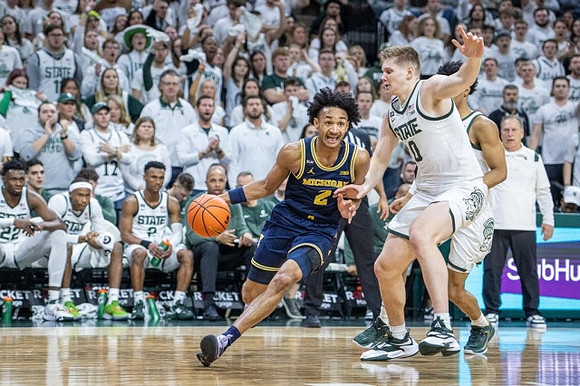 Kobe Bufkin (2) and Michigan State Head Coach Tom Izzo