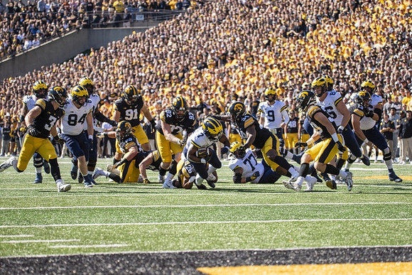 Joel Honigford (84), Donovan Edwards (7), Trevor Keegan (77), J.J. McCarthy (9), Luke Schoonmaker (86), and Ryan Hayes (76)