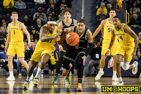 Danny Wolf (1), Roddy Gayle Jr. (11), Vladislav Goldin (50), and Nimari Burnett (4)