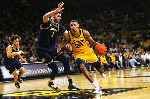 Terrance Williams II (5) and Hunter Dickinson (1)