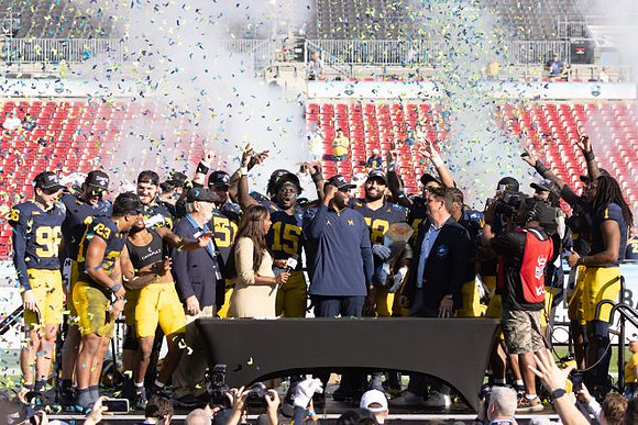 Sherrone Moore and Michigan Team