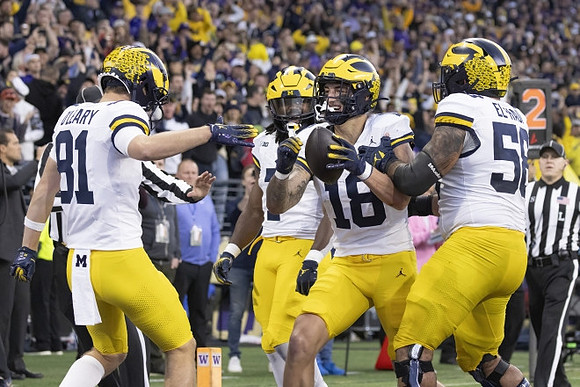 Peyton O'Leary (81), Donovan Edwards (7), Colston Loveland (18), and Giovanni El-Hadi (58)