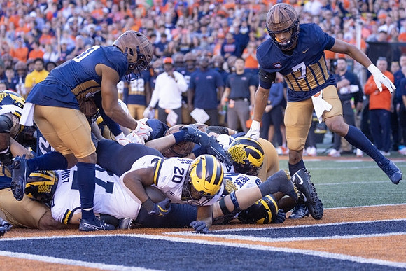 Evan Link (71), Kalel Mullings (20), and Josh Priebe (68)