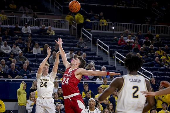 Sam Walters (24) and L.J. Cason (2)