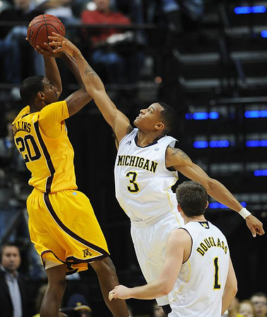 Trey Burke (3) and Stu Douglass (1)