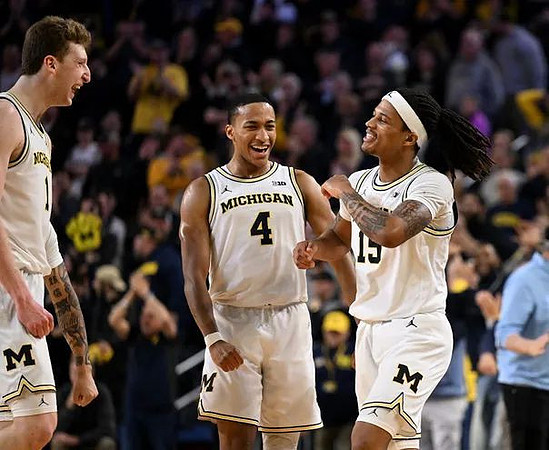 Danny Wolf (1), Nimari Burnett (4), and Rubin Jones (15)