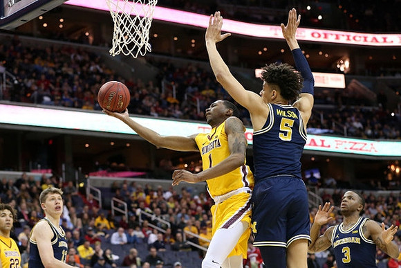 Moritz Wagner (13), D.J. Wilson (5), and Xavier Simpson (3)