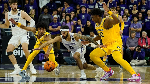 Kobe Bufkin (2), Tarris Reed Jr. (32), and Joey Baker (15)
