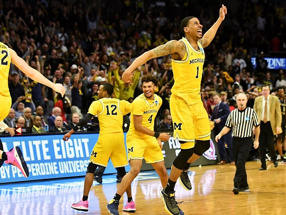 Duncan Robinson (22), Muhammad-Ali Abdur-Rahkman (12), Isaiah Livers (4), and Charles Matthews (1)