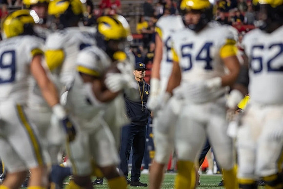 Jim Harbaugh and Michigan Team