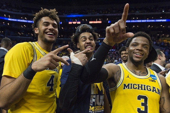Isaiah Livers (4), Jordan Poole (2), and Zavier Simpson (3)