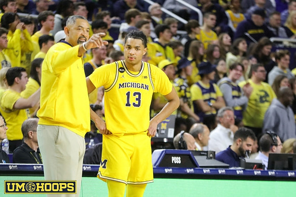 Juwan Howard and Jett Howard (13)