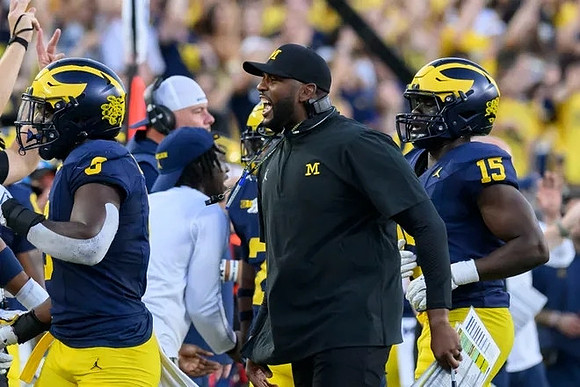 Sherrone Moore and Michigan Team