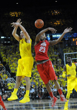 Mitch McGary (4) and Tim Hardaway Jr. (10)