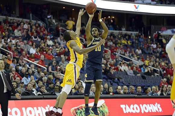 Derrick Walton Jr. (10) and Minnesota Head Coach Richard Pitino