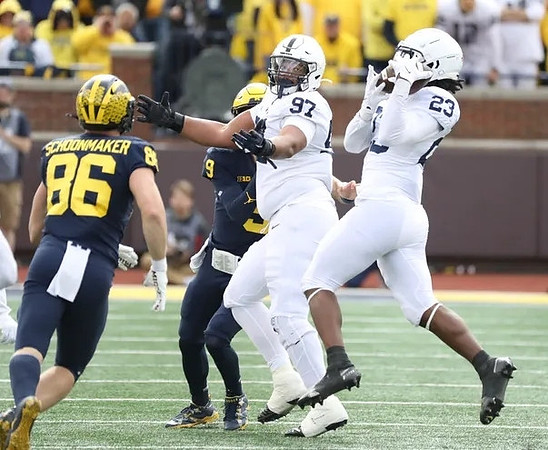 Luke Schoonmaker (86) and J.J. McCarthy (9)
