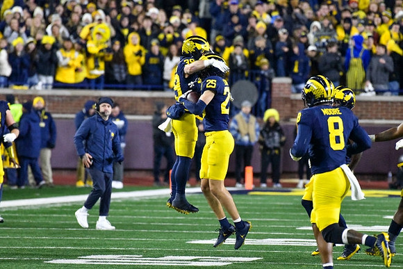 Joe Taylor (39), Mason Curtis (25), and Derrick Moore (8)