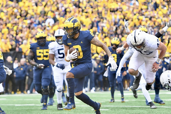 Olusegun Oluwatimi (55), Ronnie Bell (8), and J.J. McCarthy (9)