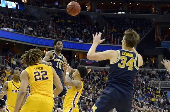 Derrick Walton Jr. (10) and Mark Donnal (34)