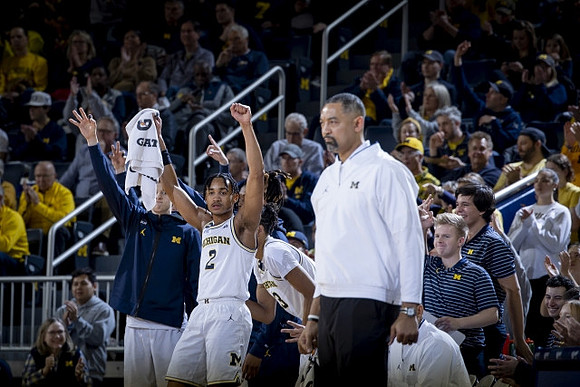 Juwan Howard and Michigan Team