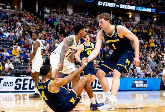 Nimari Burnett (4), Will Tschetter (42), and Danny Wolf (1)