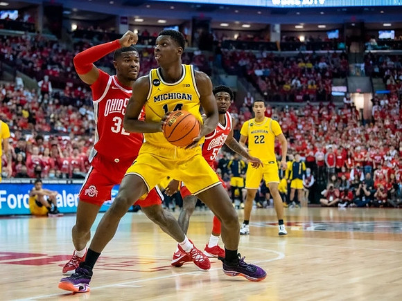 Moussa Diabate (14) and Caleb Houstan (22)